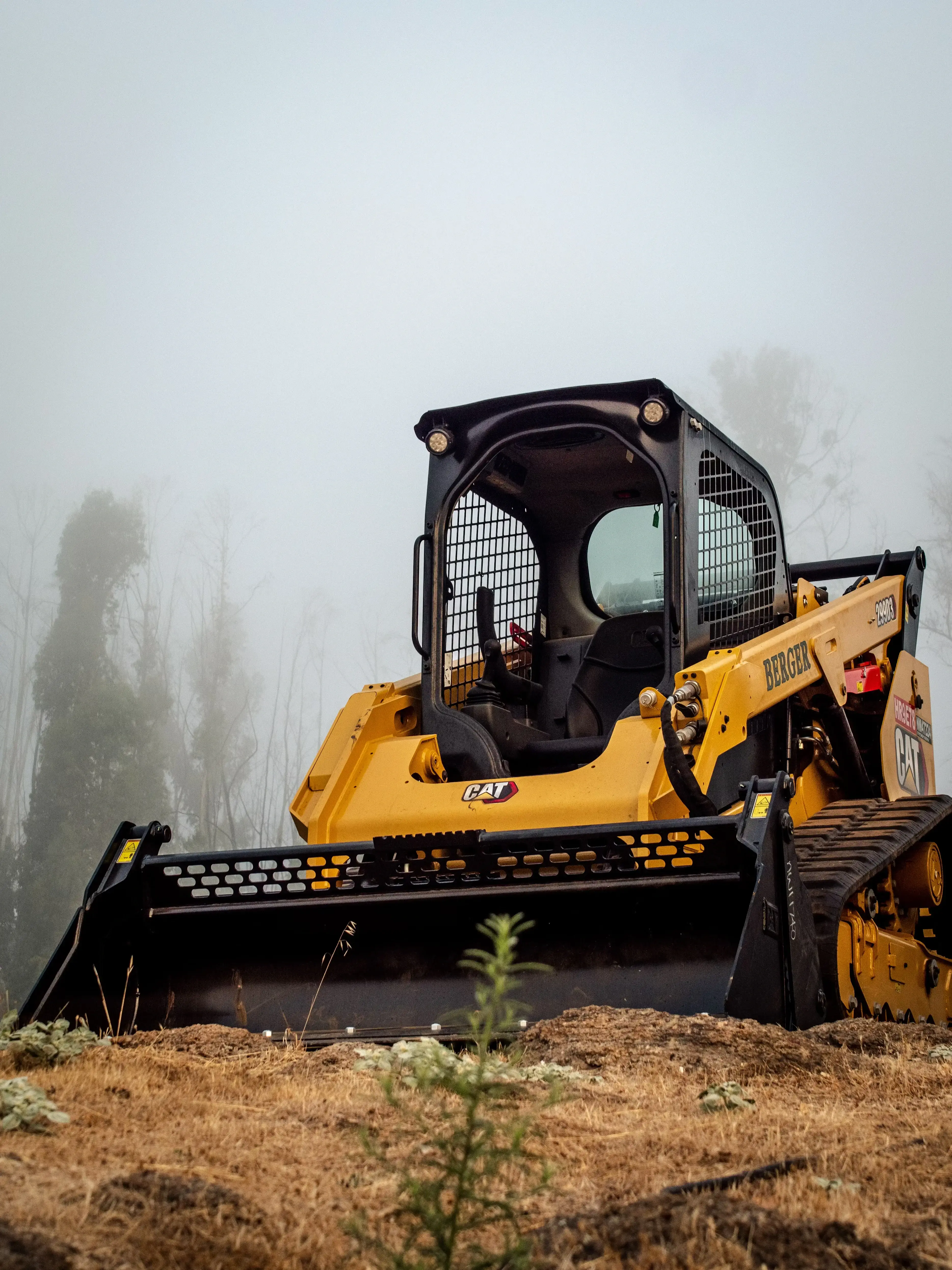 Professional Bobcat skid steer excavation contractor performing site grading and drainage solutions